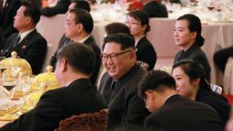 In this March 26, 2018, photo provided March 28, 2018 by the North Korean government, North Korean leader Kim Jong Un, center, smiles as he and Chinese counterpart Xi Jingping, center left, attend a banquet at the Great Hall of the People, in Beijing. North Korea's leader Kim and his Chinese counterpart Xi sought to portray strong ties between the long-time allies despite a recent chill as both countries on Wednesday, March 28, 2018, confirmed Kim's secret trip to Beijing this week. The content of this image is as provided and cannot be independently verified. Korean language watermark on image as provided by source reads: "KCNA" which is the abbreviation for Korean Central News Agency. (Korean Central News Agency/Korea News Service via AP)