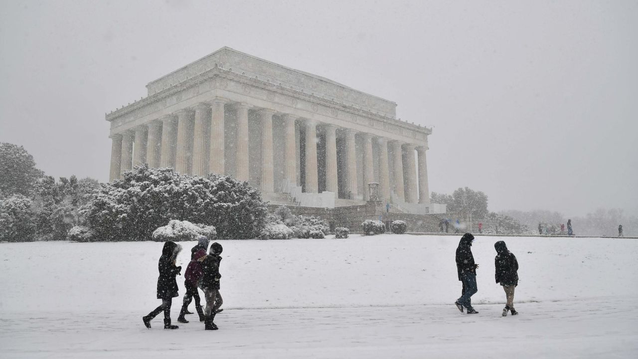 <strong>Washington, D.C.:</strong> In March, visitors gather outside The Lincoln Memorial in the US capital as the fourth nor'easter in less than three weeks hits the East Coast, bringing heavy snow and winds.