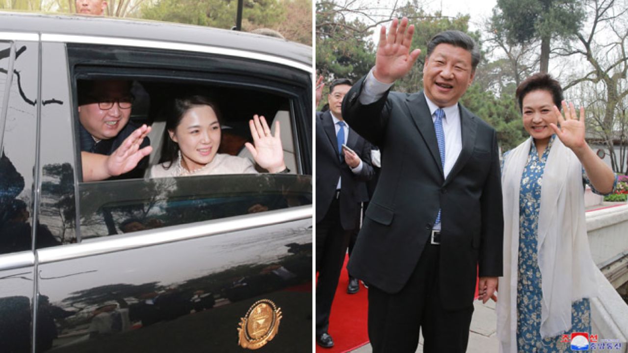 Kim and Ri wave to Xi and Peng as they leave Beijing following a successful visit to China, Kim's first official summit with another head of state. 