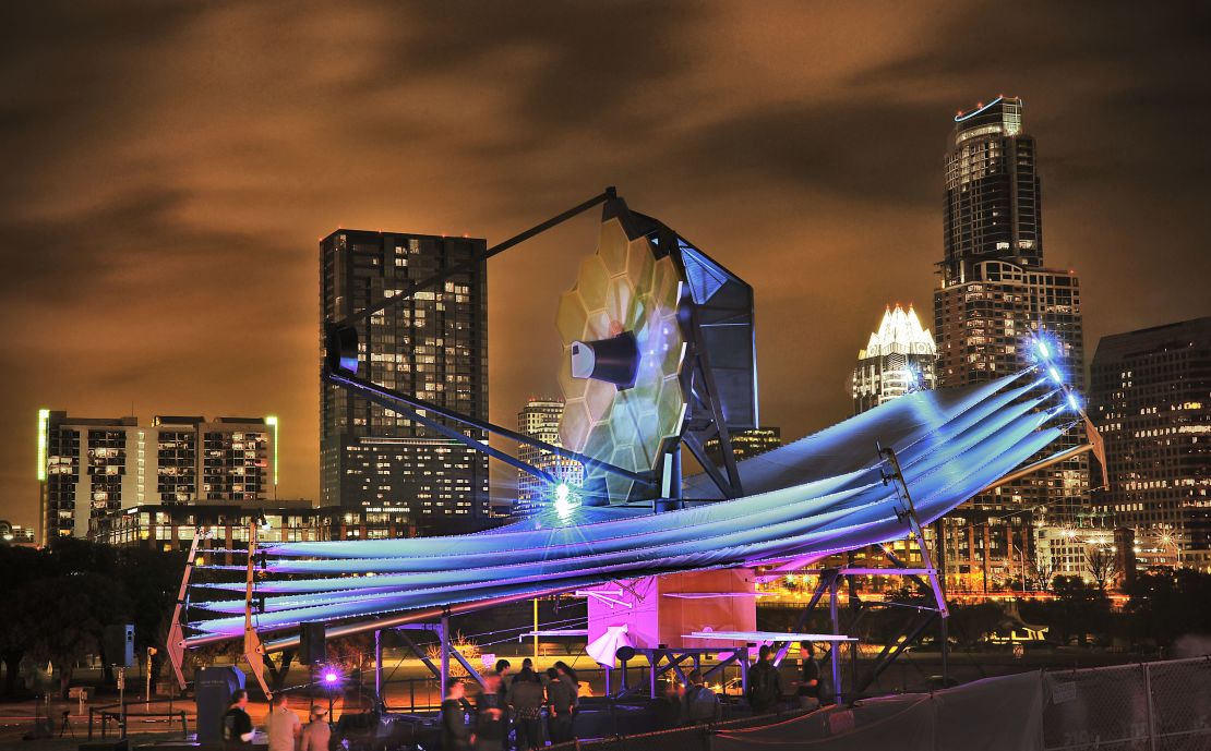 A full-scale Webb model at SXSW in Austin, showing the five-layered sunshield.