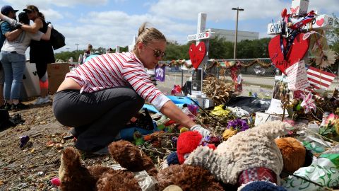 Volunteers sorted through teddy bears, flowers and hand-written letters honoring the 17 victims. 