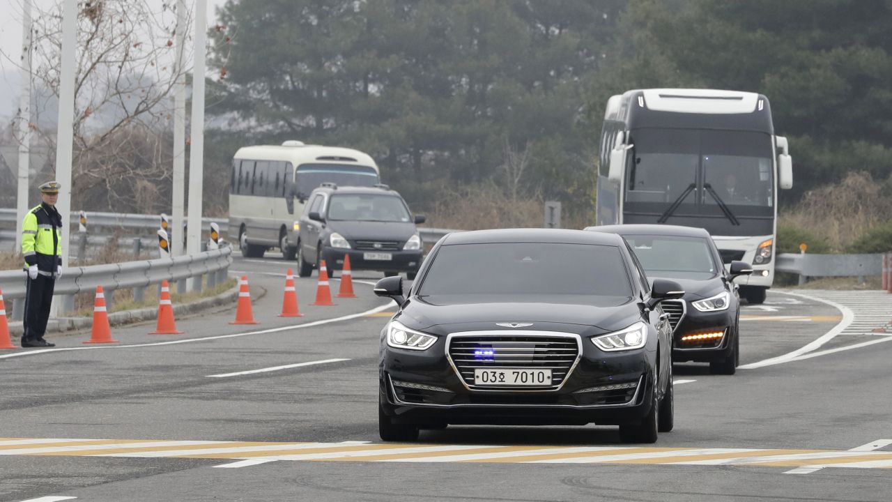 The South Korean delegation approaches the Unification Bridge on their way to talks at the DMZ, Thursday, March 29.