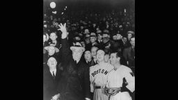 President Franklin Delano Roosevelt (1882 - 1945) throws the ball into play at a baseball game. 