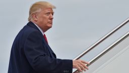 US President Donald Trump boards Air Force One at Andrews Air Force Base in Maryland on March 29, 2018, on his way to Cleveland. 
Trump is visiting Ohio to speak on infrastructure development before heading to Palm Beach, Florida. (NICHOLAS KAMM/AFP/Getty Images)