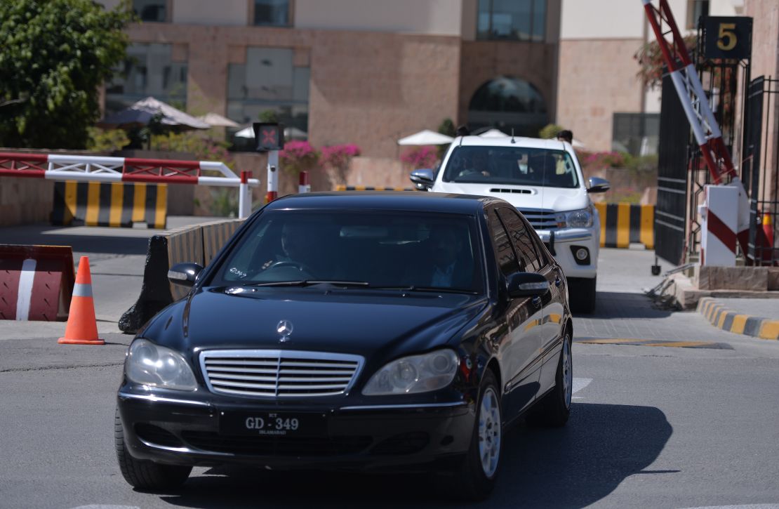 The car carrying Pakistani activist and Nobel Peace Prize laureate Malala Yousafza and her father leaves for Prime Minister House Thursday, March 29.