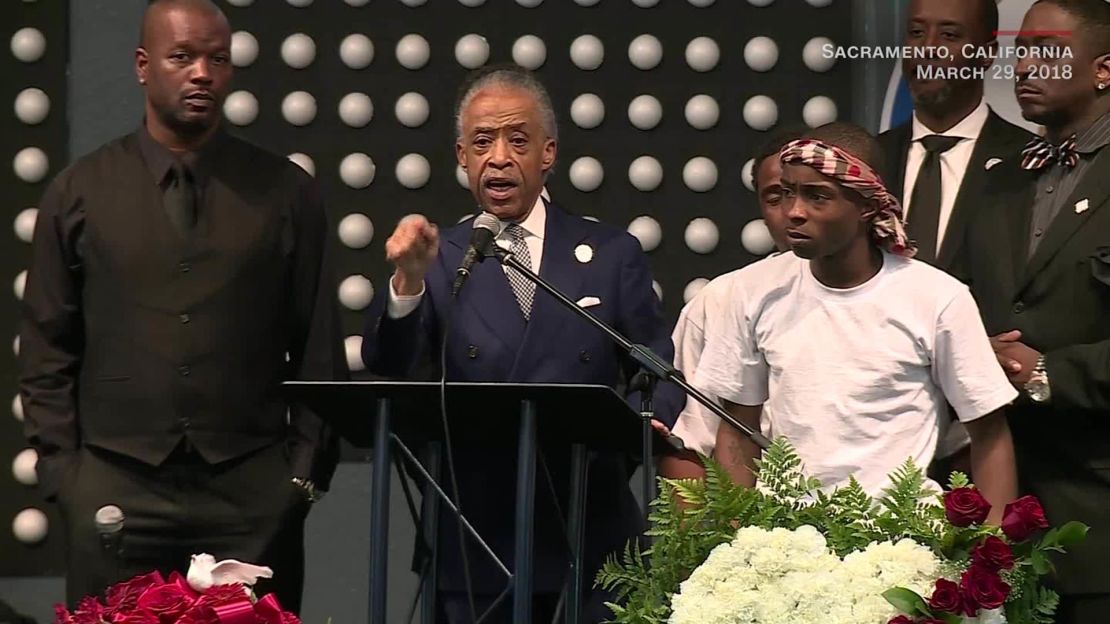 The Rev. Al Sharpton speaks at the funeral for Stephon Clark while standing next to his brother, Stevante Clark.