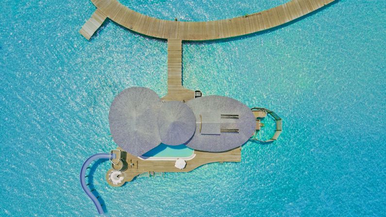 <strong>Two-Bedroom Water Retreat with Slide at Soneva Jani, Maldives: </strong>Guests can slide into the sparkling waters of the Indian Ocean from their second-story living room at this idyllic overwater villa.
