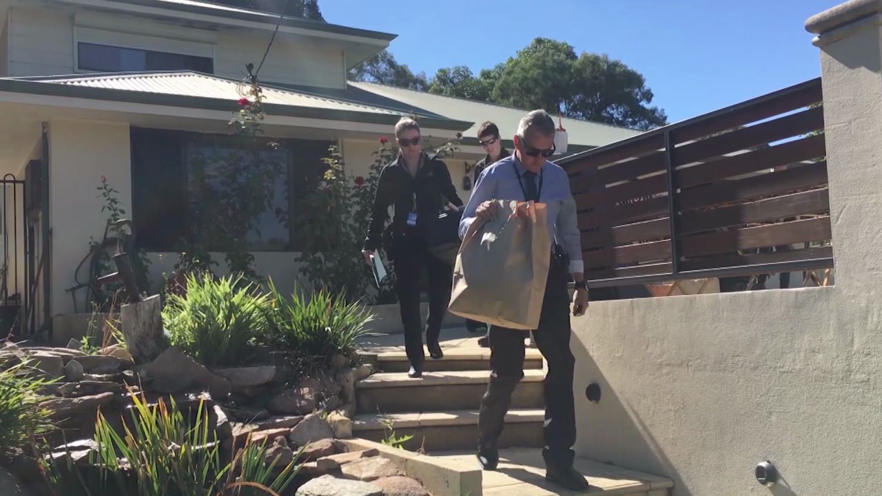 Australian police raid a house in Western Australia in March 2018 during an investigation into child sex abuses.