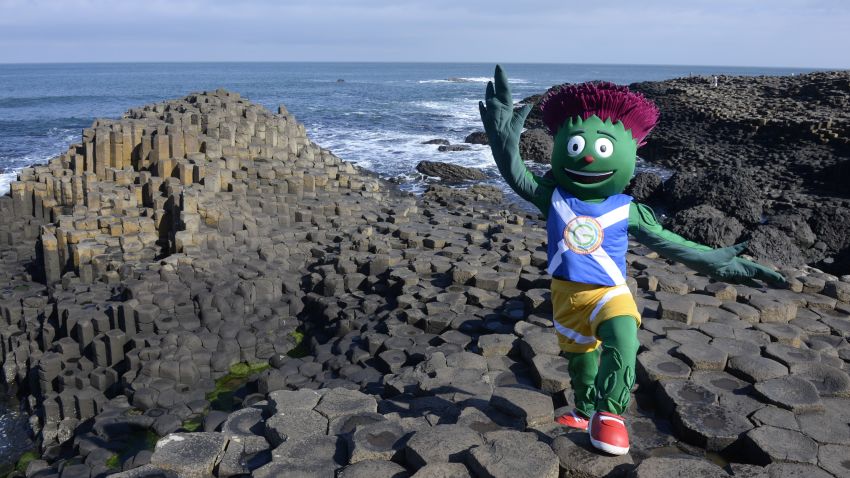 COUNTY ANTRIM, NORTHERN IRELAND - MAY 21:  (EDITORIAL USE ONLY, NO SALES)  In this handout image provided by Glasgow 2014 Ltd, Clyde, the 2014 Commonwealth Games mascot, poses at the Giants Causeway during the Glasgow 2014 Baton Relay on May 21, 2014 in County Antrim, Northern Ireland. Northern Ireland is nation 67 of 70 nations and territories the Queen's Baton will visit.  (Photo by Ben Birchall/Glasgow 2014 Ltd via Getty Images)