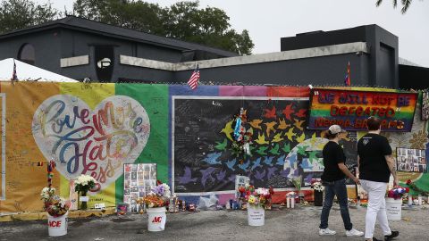 People visit a makeshift memorial  in Orlando on June 12, 2017 -- one year to the day after the Pulse nightclub shooting. 