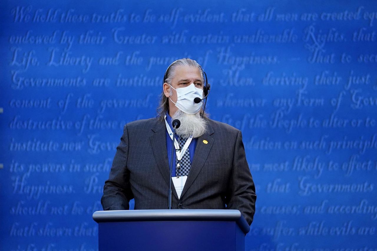 A member of the production team checks a microphone ahead of the first presidential debate on Tuesday in Ohio.