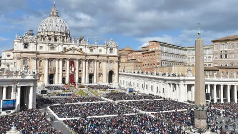 Thousands of people attend Easter Mass at St Peter's Square.