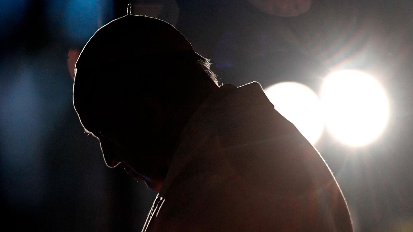 Francis leads the Way of the Cross torchlight procession in front of the Colosseum in Rome in March 2018.