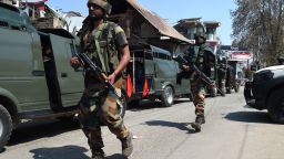 Indian army soldiers patrol during a gun-battle between Indian government forces and militants in Kashmir on April 1, 2018. (Photo credit: TAUSEEF MUSTAFA/AFP/Getty Images)