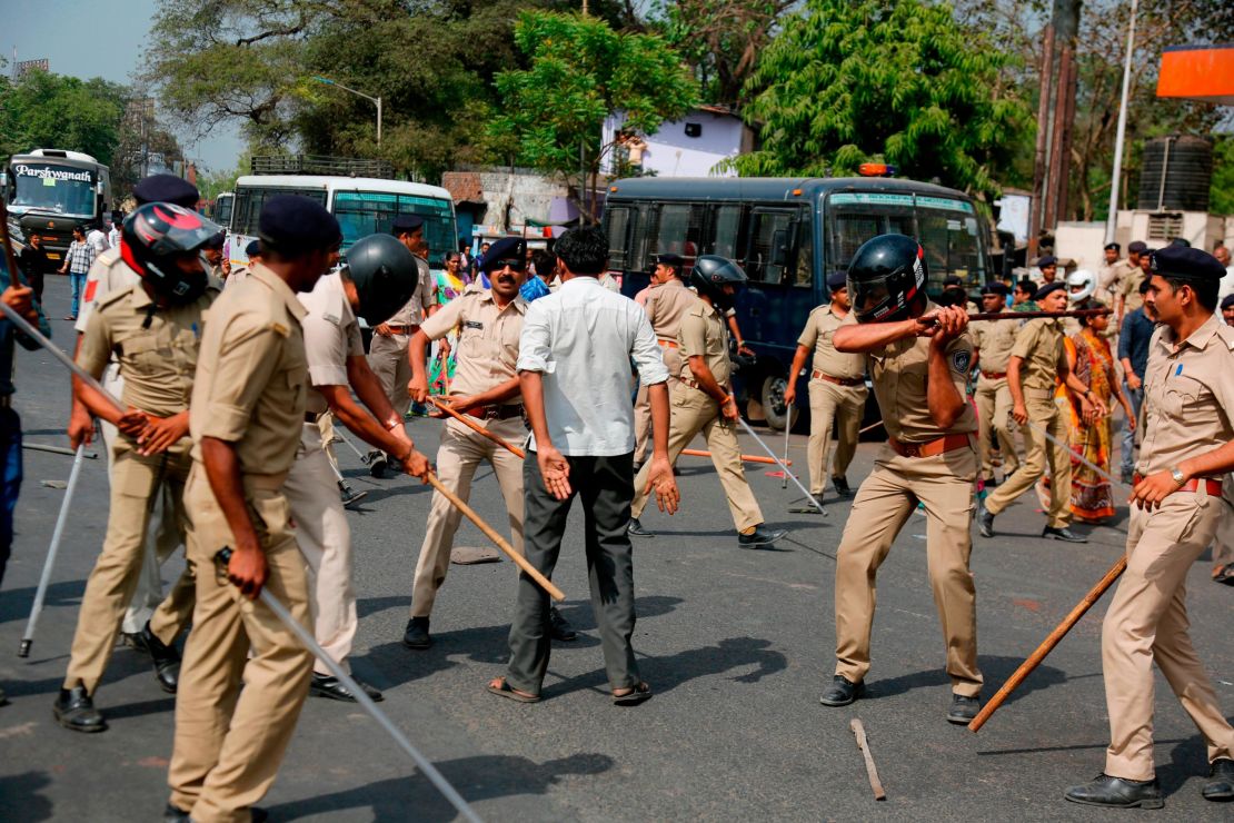 Police beat a lower-caste Dalit man in Ahmadabad on Monday as demonstrations spread.
