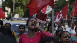 Members of Dalit organisations and leftist outfits shout slogans during a protest in Mumbai, India, Monday, April 2, 2018 .Violence has erupted in several parts of north and central India as thousands of dalits, members of Hinduism's lowest caste, protest an order from the country's top court that they say dilutes legal safeguards put in place for their marginalized community. (AP Photo/Rafiq Maqbool)