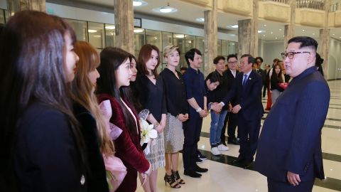 North Korean leader Kim Jong-Un speaks to South Korean musicians after the concert, in this photo released from North Korea's official Korean Central News Agency (KCNA).