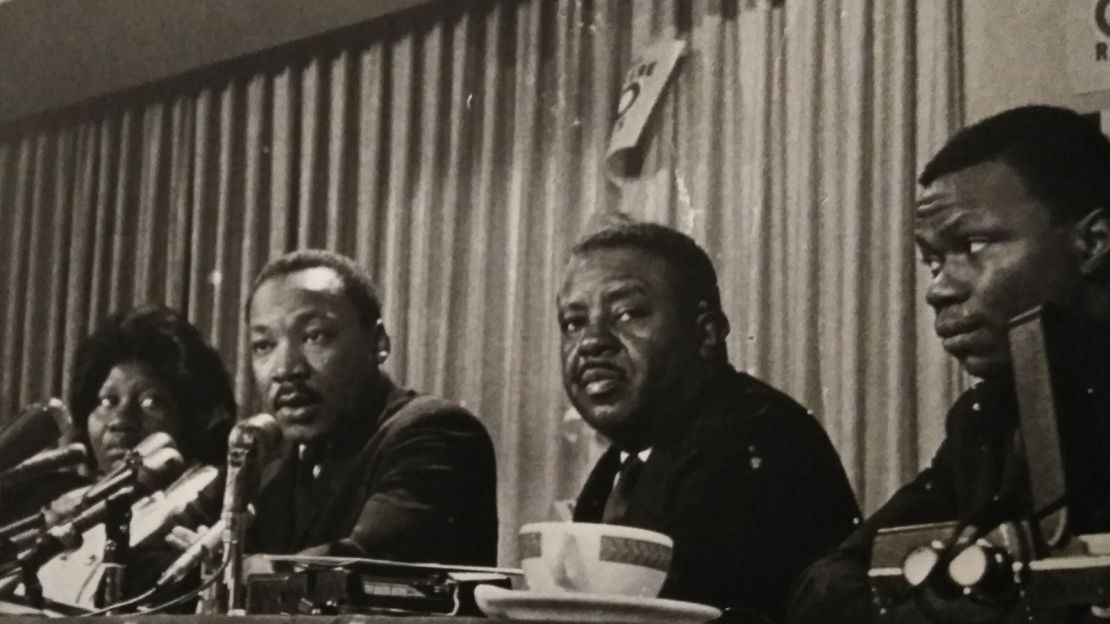 Dr. Martin Luther King Jr. and Rev. Al Sampson (far right) at an event for the Poor People's Campaign in Chicago in 1968.