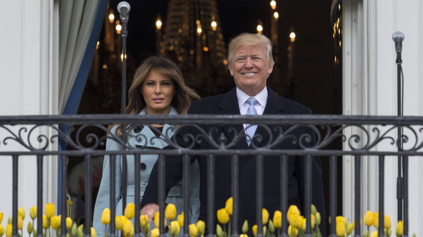 President Donald Trump and first lady Melania Trump arrives on the Truman Balcony of the White House in Washington, Monday, April 2, 2018, for the annual White House Easter Egg Roll. (AP/Carolyn Kaster)