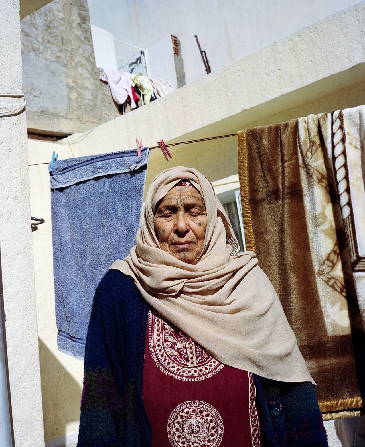However, the majority of women had positive stories to tell. Al-Arashi met Aisha, pictured here, just outside of the Tunisian capital, Tunis. Aisha said she received her tattoos after marriage to symbolize her womanhood.