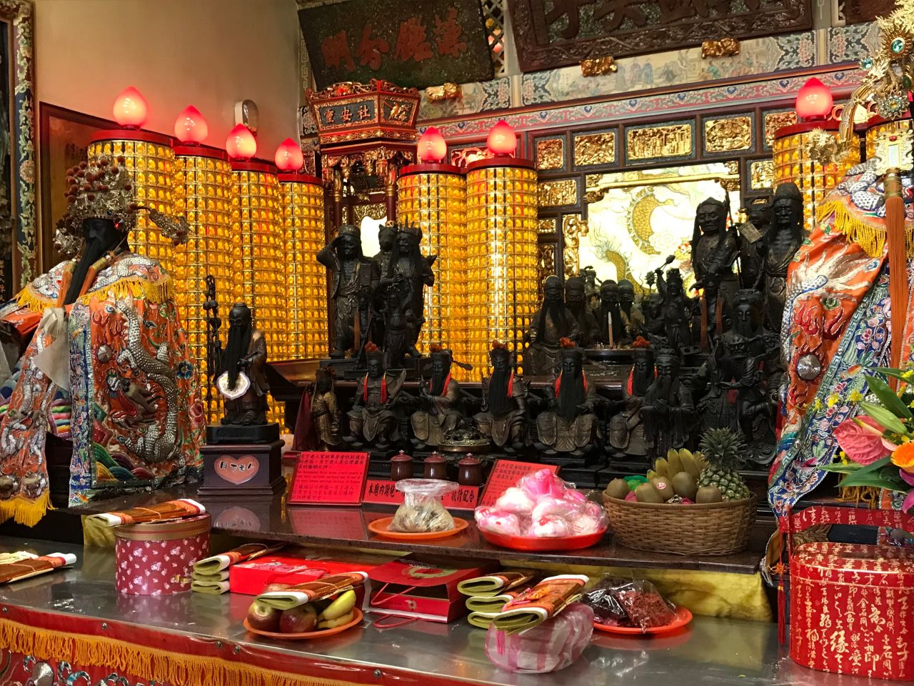 The Love God, or Yue Lao, is the second small statue from the left.