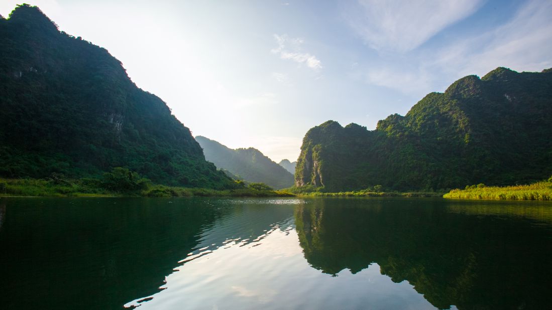 <strong>Trang An Grottoes:</strong> Part of a massive eco-tourism complex in southern Vietnam, the Trang An grottoes are best explored by boat. A maze of rivers and caves, the UNESCO World Centre is defined by its craggy limestone facades and jade green water. The surrounding area was once occupied by Neolithic hunters and gatherers, and is now home to tiny villages, pretty paddy fields, temples and hiking trails.  