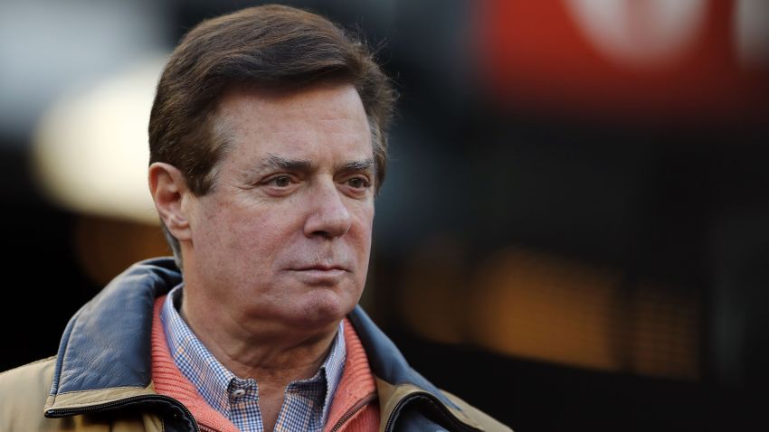 NEW YORK, NEW YORK - OCTOBER 17: Former Donald Trump presidential campaign manager Paul Manafort looks on during Game Four of the American League Championship Series at Yankee Stadium on October 17, 2017 in the Bronx borough of New York City. (Photo by Elsa/Getty Images)