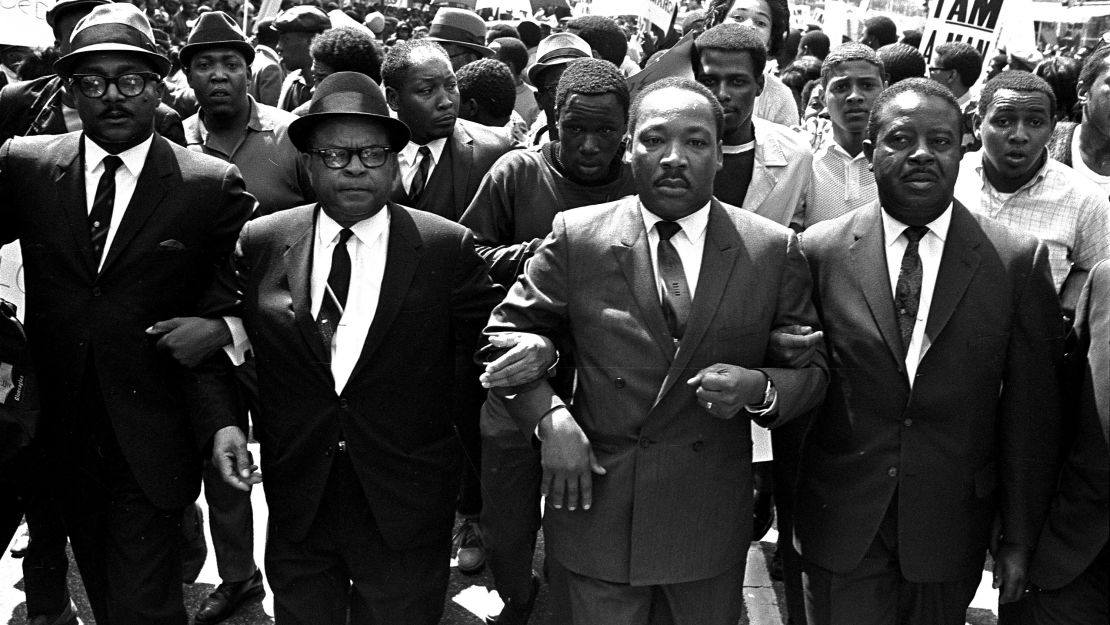 The Rev. Ralph Abernathy, right, and Bishop Julian Smith, left, flank Dr. Martin Luther King, Jr., during a civil rights march in Memphis on March 28, 1968 -- one week before King was shot.