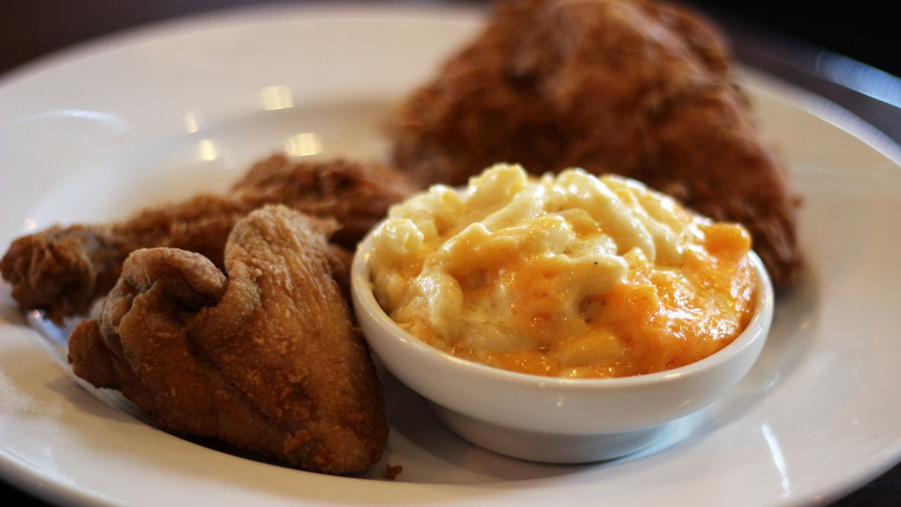 <strong>Paschal's fried chicken:</strong> Made to the original recipe and served with wilted collard greens and oozy mac 'n' cheese, the fried chicken's crispy, peppery coating gives way to buttery-soft meat.