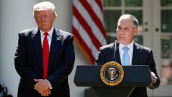 President Donald Trump listens as EPA Administrator Scott Pruitt speaks about the U.S. role in the Paris climate change accord, Thursday, June 1, 2017, in the Rose Garden of the White House in Washington. (AP Photo/Pablo Martinez Monsivais)