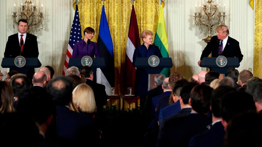 President Donald Trump speaks during a news conference with, from left, Latvian President Raimonds Vejonis, Estonian President Kersti Kaljulaid, and Lithuanian President Dalia Grybauskaite in the East Room of the White House, Tuesday, April 3, 2018, in Washington. (AP Photo/Evan Vucci)