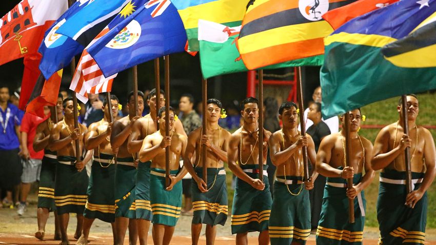 APIA, SAMOA - SEPTEMBER 11:  Participants hold flags aloft during the Closing Ceremony at the Apia Park Sports Complex on day five of the Samoa 2015 Commonwealth Youth Games on September 11, 2015 in Apia, Samoa.  (Photo by Scott Barbour/Getty Images)
