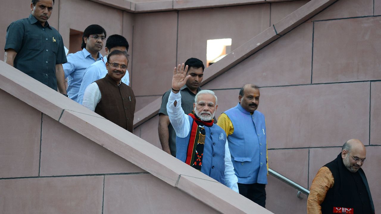 The government of Indian Prime Minister Narendra Modi, center, faced criticism over the measure.