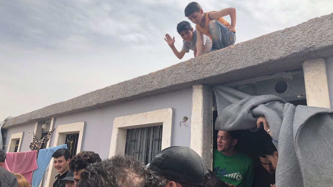 At Harjala camp, kids play on rooftops after weeks of being holed up in basements in Eastern Ghouta.