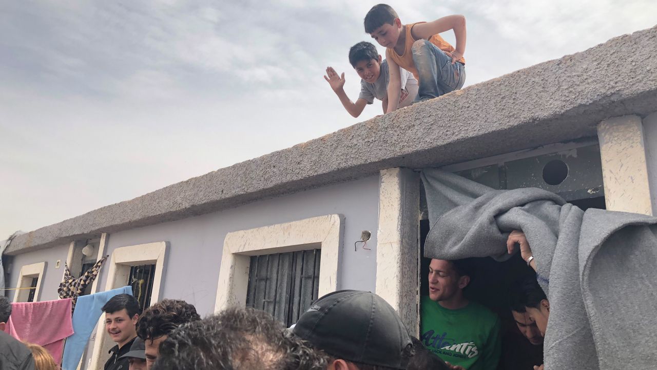 At Harjala camp, kids play on rooftops after weeks of being holed up in basements in Eastern Ghouta.