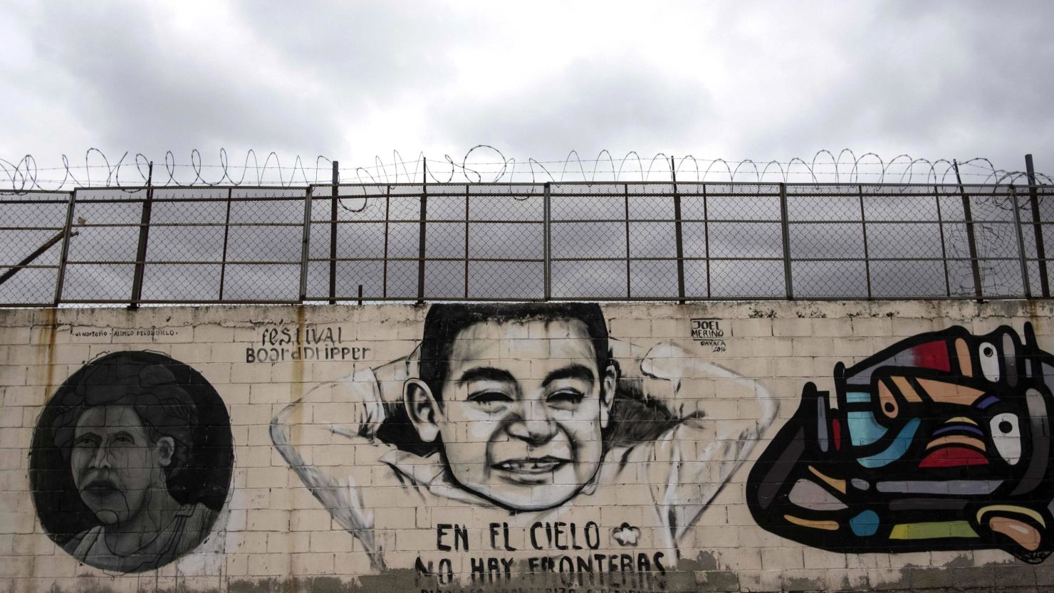 View of murals reading "In the sky there are no borders" on the US-Mexico border wall in Tijuana, Baja California, northwestern Mexico on April 2, 2018. 
