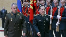 Russian Defense Minister Sergei Shoigu, left, and China's Defense Minister Wei Fenghe review an honour guard prior to their talks in Moscow, Russia, Tuesday, April 3, 2018. Wei emphasized that his visit to Russia is intended to underline close ties between the two nations and their intention to deepen strategic cooperation. (Vadim Savitsky/Russian Defense Ministry Press Service via AP)