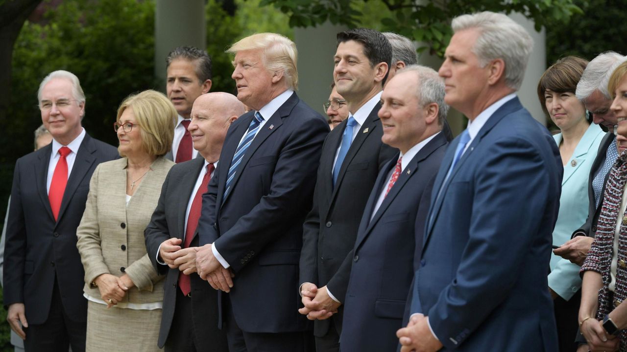 Seeing Rep. Mike Bishop, third from left, celebrating the House attempt to repeal Obamacare, drove Slotkin to challenge him.