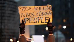 CHICAGO, IL - APRIL 02:  In recognition of the 50th anniversary of the death of Dr. Martin Luther King Jr., and in solidarity with the family and supporters of Stephon Clark and others killed by police, demonstrators protest and march in the Magnificent Mile shopping district on April 2, 2018 in Chicago, Illinois. Dr. King was killed on April 4, 1968.  