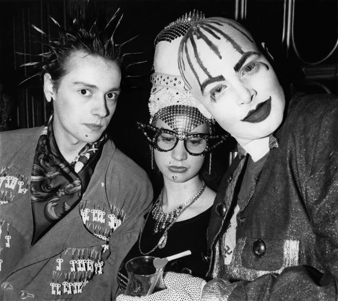 Short-lived London club Taboo, broke with the norms of the UK's nightlife scene with its diverse, "polysexual" clientele. Founder Leigh Bowery (right) is pictured here in 1985 alongside his future wife Nicola Bateman and club performer Trojan.  