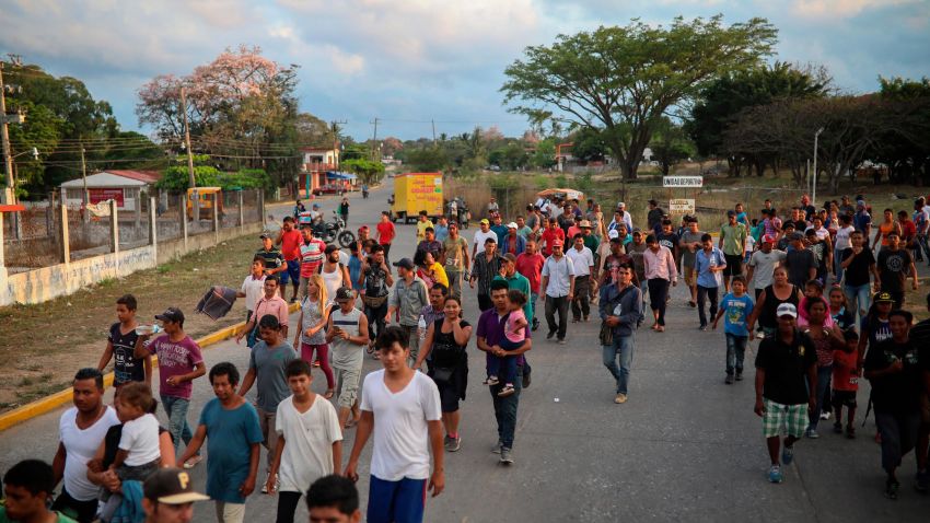 Central American migrants traveling with the annual Stations of the Cross caravan march to call for migrants' rights and protest the policies of U.S. President Donald Trump and Honduran President Juan Orlando Hernandez, in Matias Romero, Oaxaca State, Mexico, Tuesday, April 3, 2018. Bogged down by logistical problems, large numbers of children and fears about people getting sick, the caravan was always meant to draw attention to the plight of migrants and was never equipped to march all the way to the U.S. border.(AP Photo/Felix Marquez)