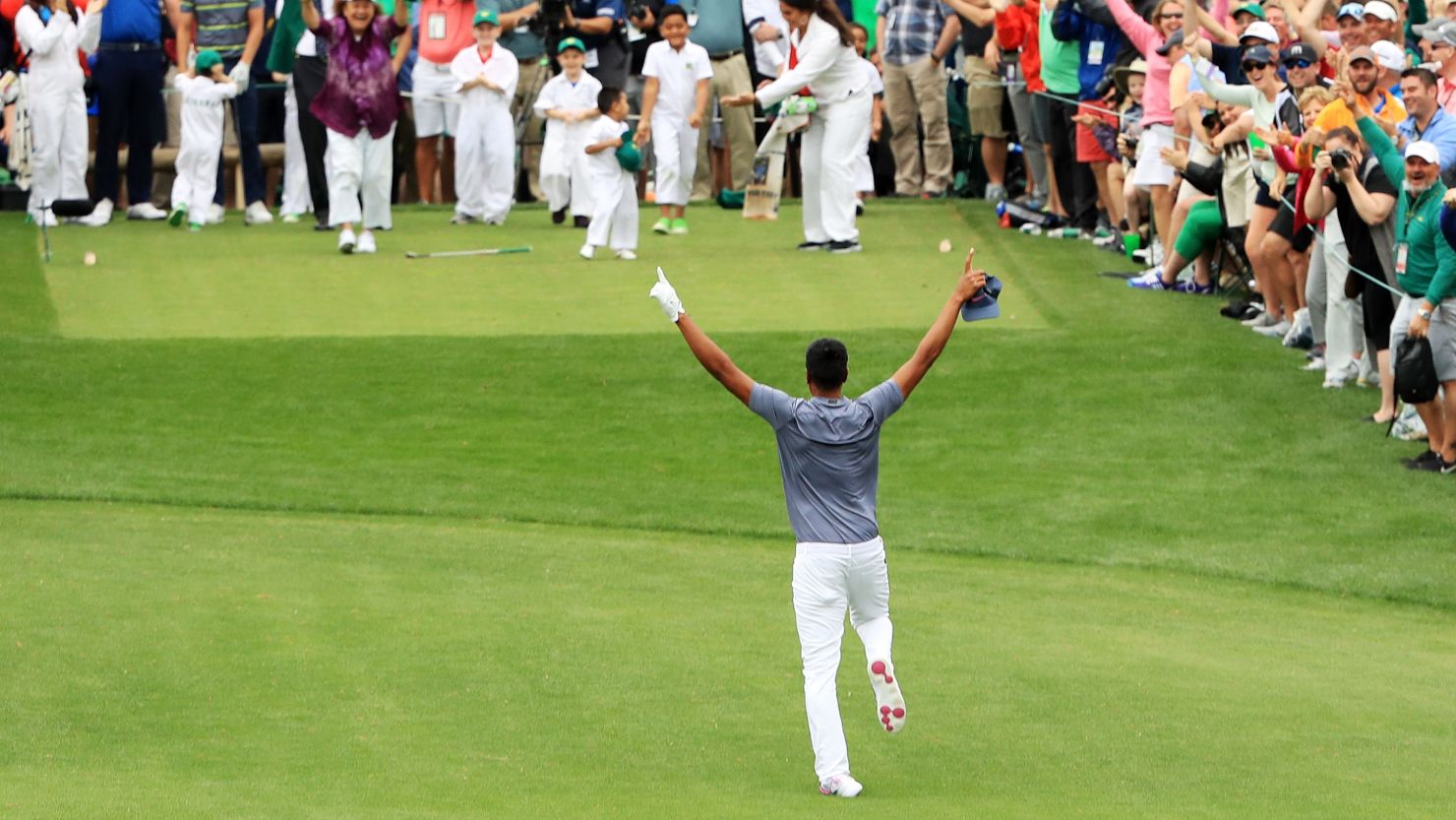 Tony Finau celebrates a hole-in-one before dislocating his ankle at Augusta.