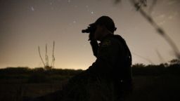 A Border Patrol agent used night vision goggles in April to look for immigrants who illegally crossed from Mexico into the U.S. in the Rio Grande Valley sector in Texas, one of the more dangerous areas for agents.