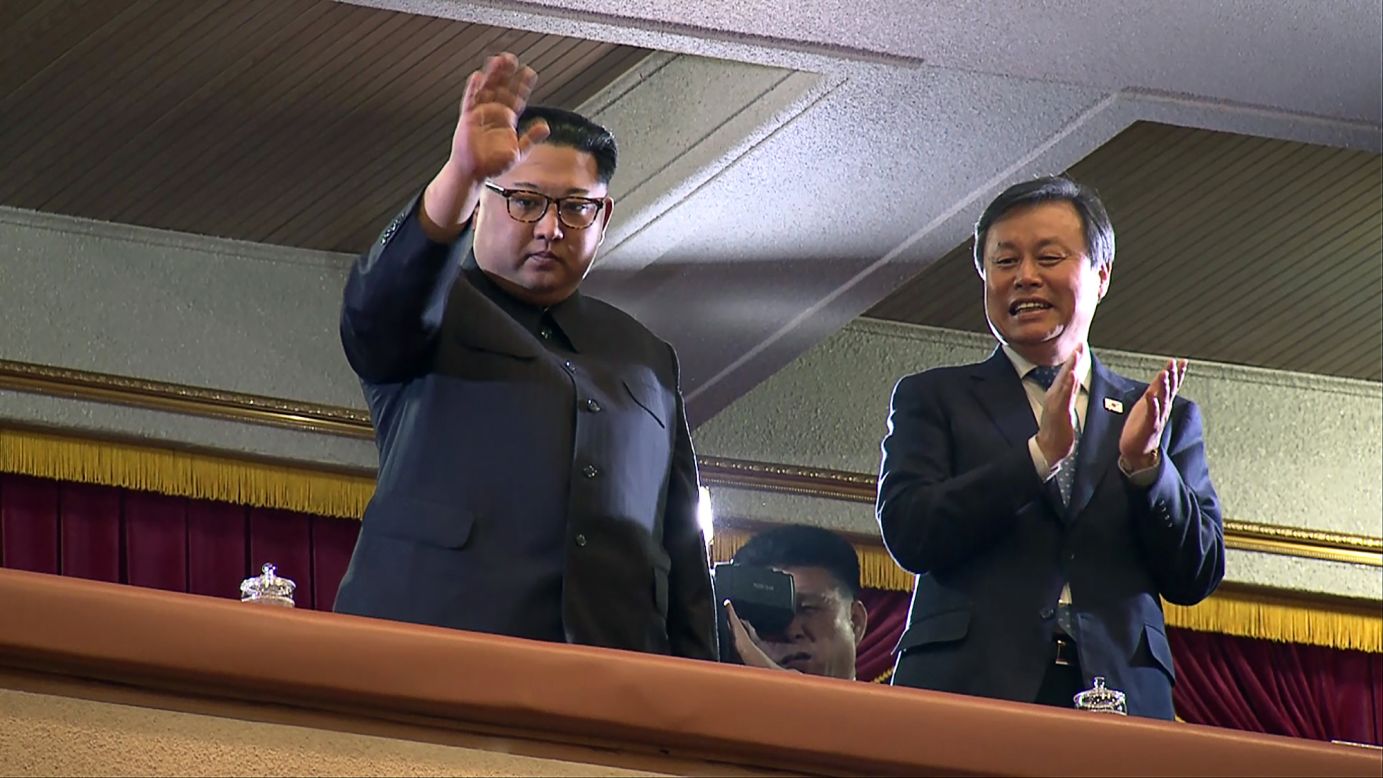 North Korean leader Kim Jong Un, left, waves to people in Pyongyang, North Korea, as he attends <a href="https://www.cnn.com/2018/04/01/world/kim-jong-un-concert-kpop/index.html" target="_blank">a rare concert featuring South Korean singers and performers</a> on Sunday, April 1. The concert, which included the popular girl band Red Velvet, marked the first time in over a decade that South Korean musicians have traveled to North Korea.