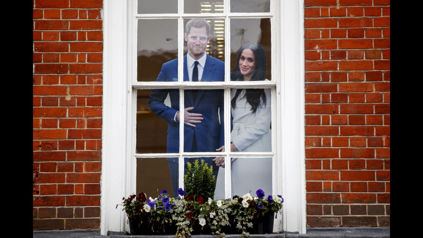 A cutout of Britain's Prince Harry and his fiancee, American actress Meghan Markle, stands in the window of a gift shop in Windsor, England, on Sunday, April 1. The couple will be married on May 19. <a href="http://www.cnn.com/2018/03/12/world/gallery/prince-harry-meghan-markle-relationship/index.html" target="_blank">See photos of the royal romance</a>