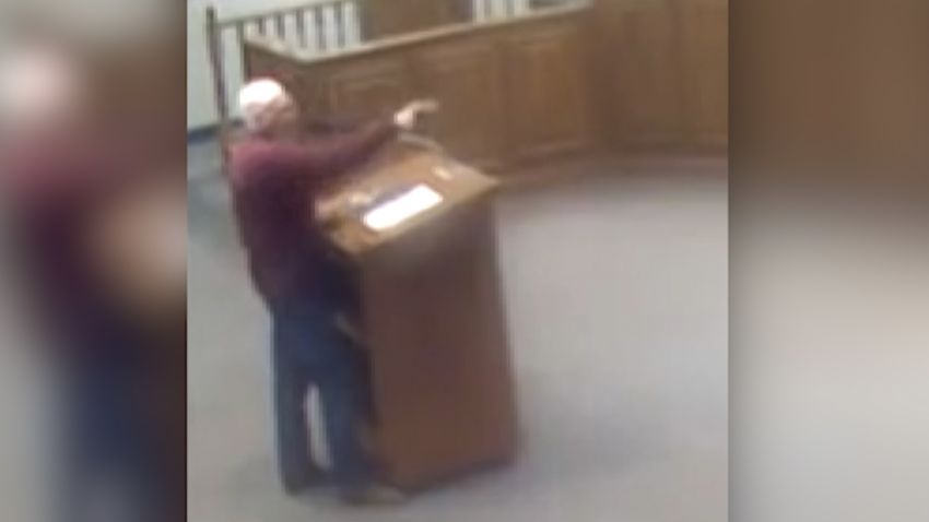 Larry Johnson, a retired politician in Georgia, drops the n-word while talking to a black man during a meeting.