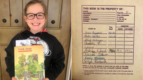 Marley Parker holds a book assigned to her that was apparently used by singer Blake Shelton in 1982.