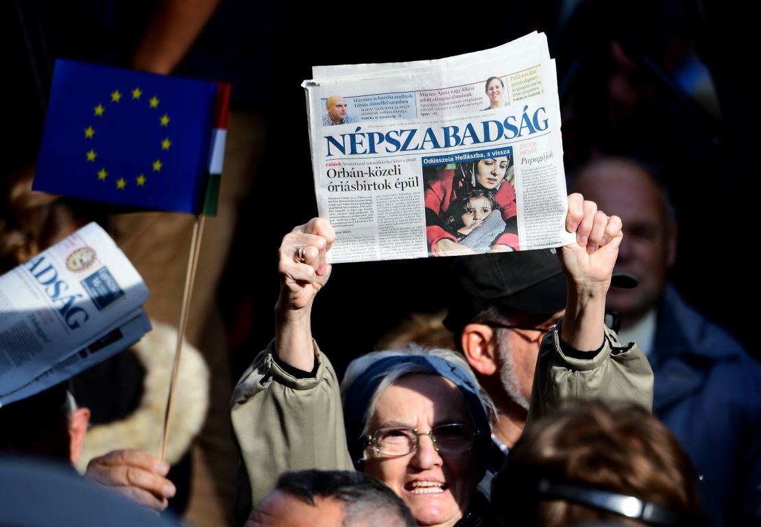Journalists and supporters of newspaper Nepszabadsag protest in Budapest on October 16, 2016.