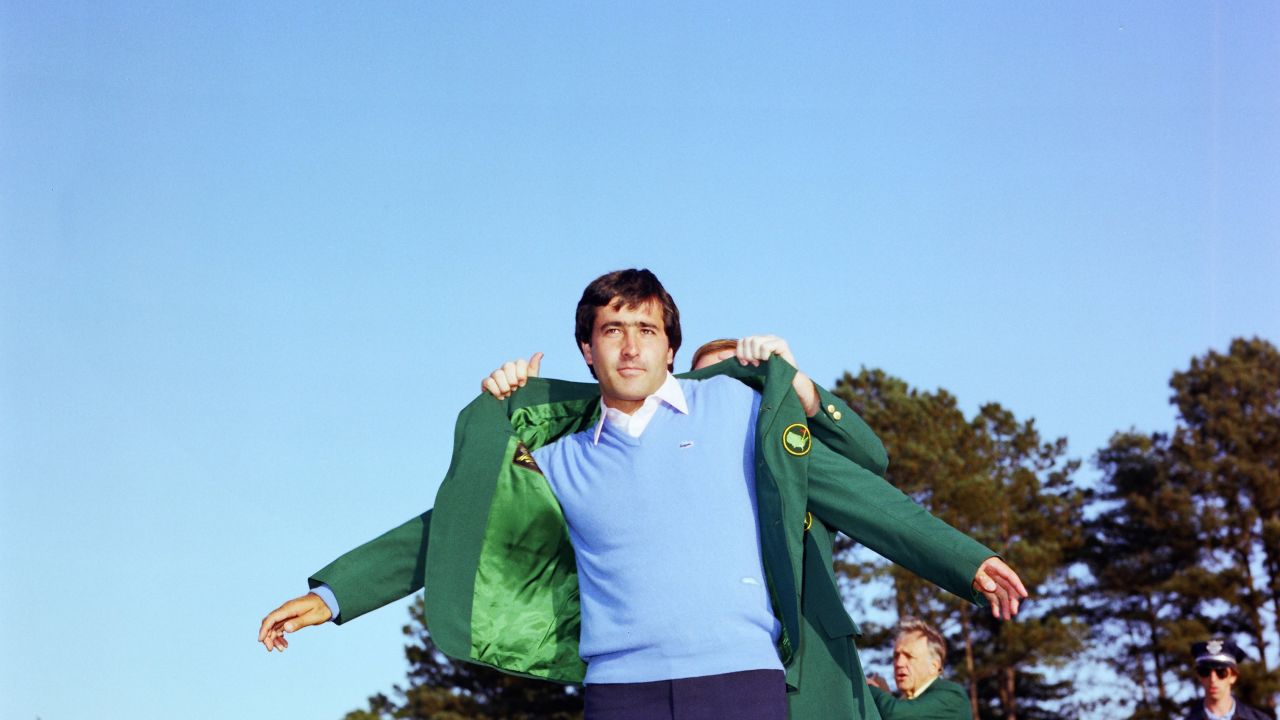 AUGUSTA, GA - APRIL 1983:  Seve Ballesteros puts on the Green Jacket during the 1983 Masters Tournament at Augusta National Golf Club on APRIL 11th, 1983 in Augusta, Georgia. (Photo by Augusta National/Getty Images)
