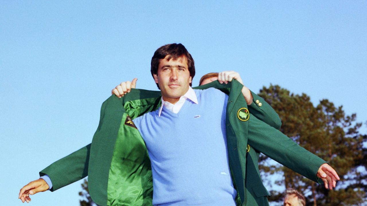 AUGUSTA, GA - APRIL 1983:  Seve Ballesteros puts on the Green Jacket during the 1983 Masters Tournament at Augusta National Golf Club on APRIL 11th, 1983 in Augusta, Georgia. (Photo by Augusta National/Getty Images)